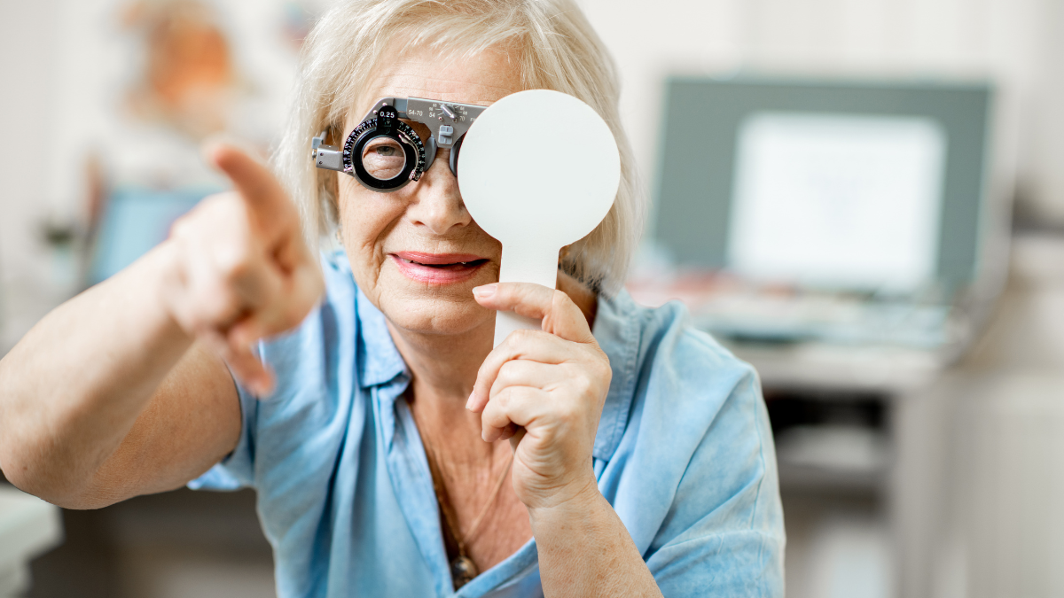 Senior giving eye exam